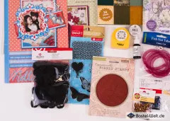 Detailausschnitt mit Nellie’s-Choice-Kartenset, Stencil-1-Clear-Stamps, Fisch-Netzband und Hero-Arts-Kautschukstempel „Repositionable Rubber Stamps“.
